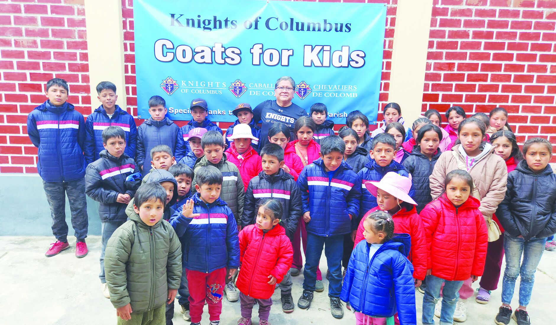 Huasta House of Hope residents receive winter coats